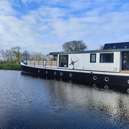 8 Personen Hausboot Mit Hot Tub, Sauna, Kaminofen, Klimaanlage, Lounge, Sonnendeck Und Garten Mit Buddelschiff Direkt Hinterm Deich In